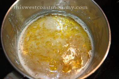 The ghee is done when the milk solids caramelize.