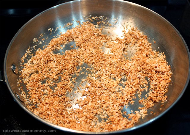 Toast coconut in skillet over medium heat for 5-7 minutes, stirring frequently until golden brown.