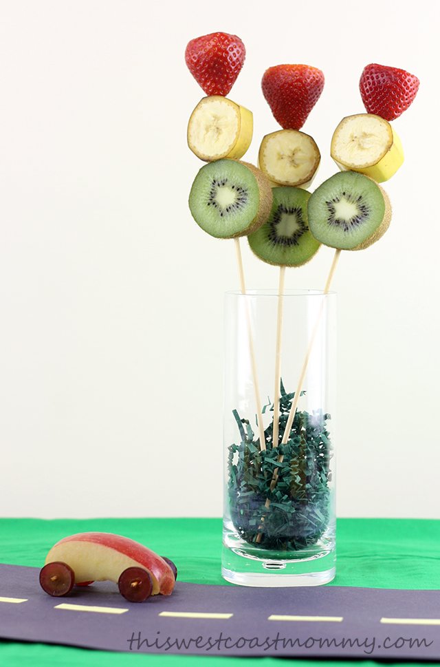 Make these traffic light fruit kebabs with strawberry, banana, and kiwi. Great for a centrepiece at your road trip birthday party!