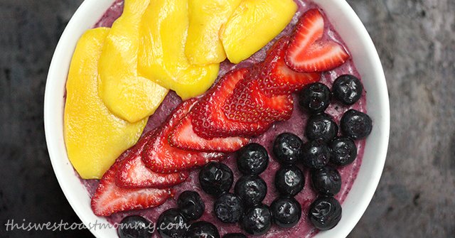 This delicious Mango Berry Smoothie Bowl is made with President's Choice lactose-free yogurt so everyone can enjoy this rich, creamy, frosty treat!
